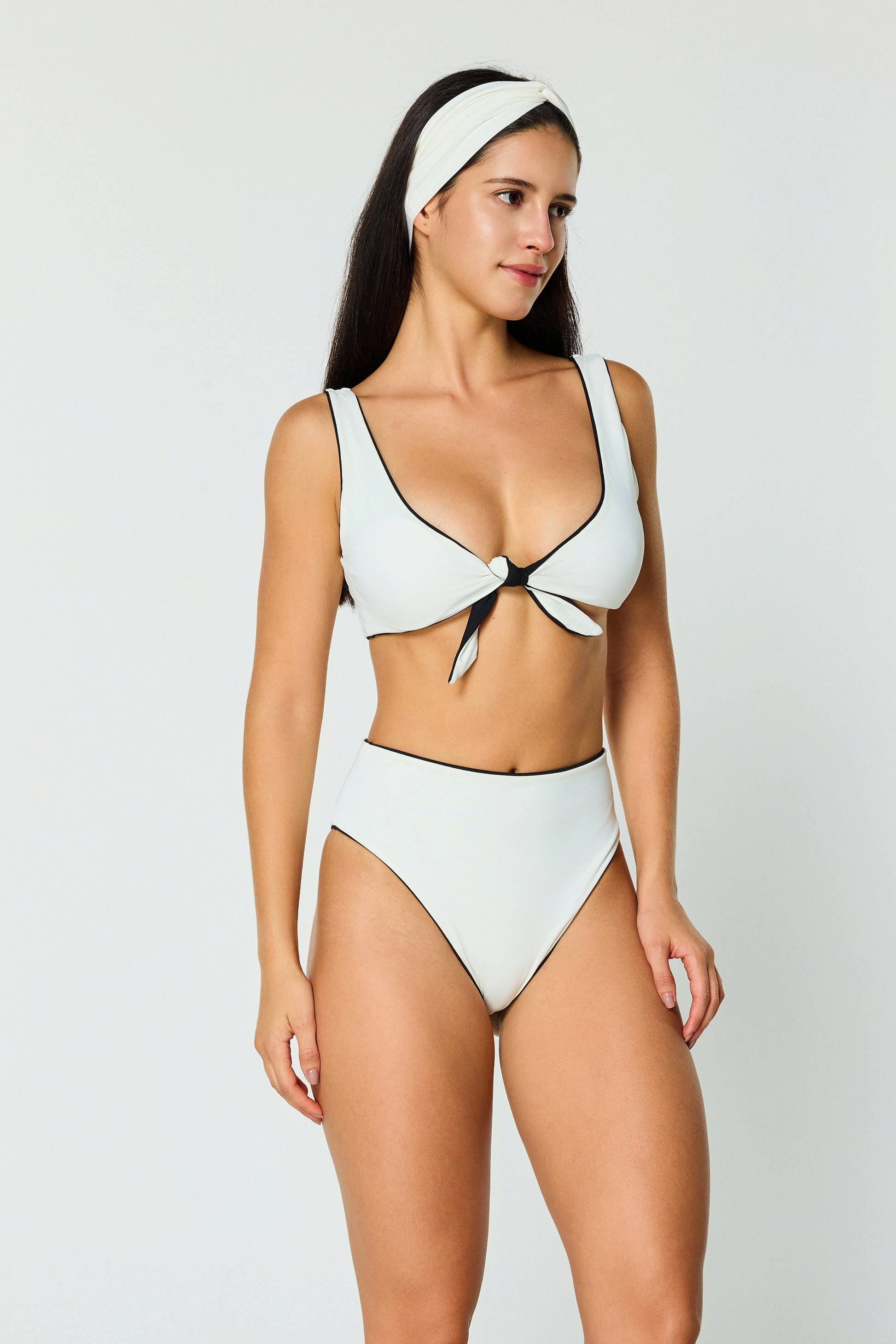 black white reversible bikini on model front view full body

